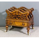 A Victorian figured walnut three division Canterbury with shaped and fretted divisions, fitted one