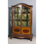 An Edwardian mahogany display cabinet inlaid throughout with boxwood stringings and chequered