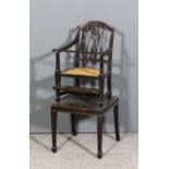 A child's mahogany armchair of Hepplewhite design, the arched back with four upright splats carved