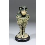 A good early 20th Century Martinware stoneware "Grotesque" bird, the detachable head modelled with a