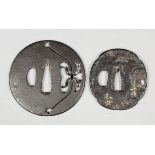 Two Japanese iron Tsubas, one pierced with the "Magic Sack of Hotei" (one of the Gods of Good