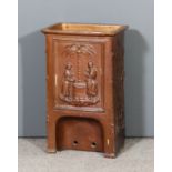 A late Victorian brown glazed stoneware cistern, the front moulded in relief with figures by a well,