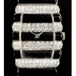 An Elizabeth II lady's 18ct white gold, onyx and diamond set Piaget wristwatch, the diamond and onyx