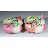 A pair of Chinese "Famille Rose" porcelain four division fruit boxes and covers, each 9.75ins (