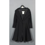 A late 1980's Christian Dior black wool crepe and silk sleeveless dress with original design label