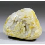 A Chinese pale green jade "Three Star God" mountain of pebble form, carved in low relief with the