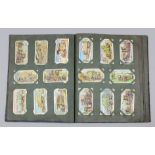 An interesting small collection of early 20th Century and later cigarette cards, including - part