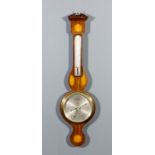 An Edwardian mahogany cased aneroid wheel barometer and thermometer retailed by J. Parkes & Sons, 11