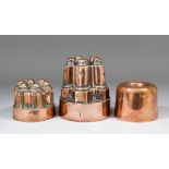 Three Victorian copper jelly moulds, the first marked with the maker's mark for "Jones Bros. Down