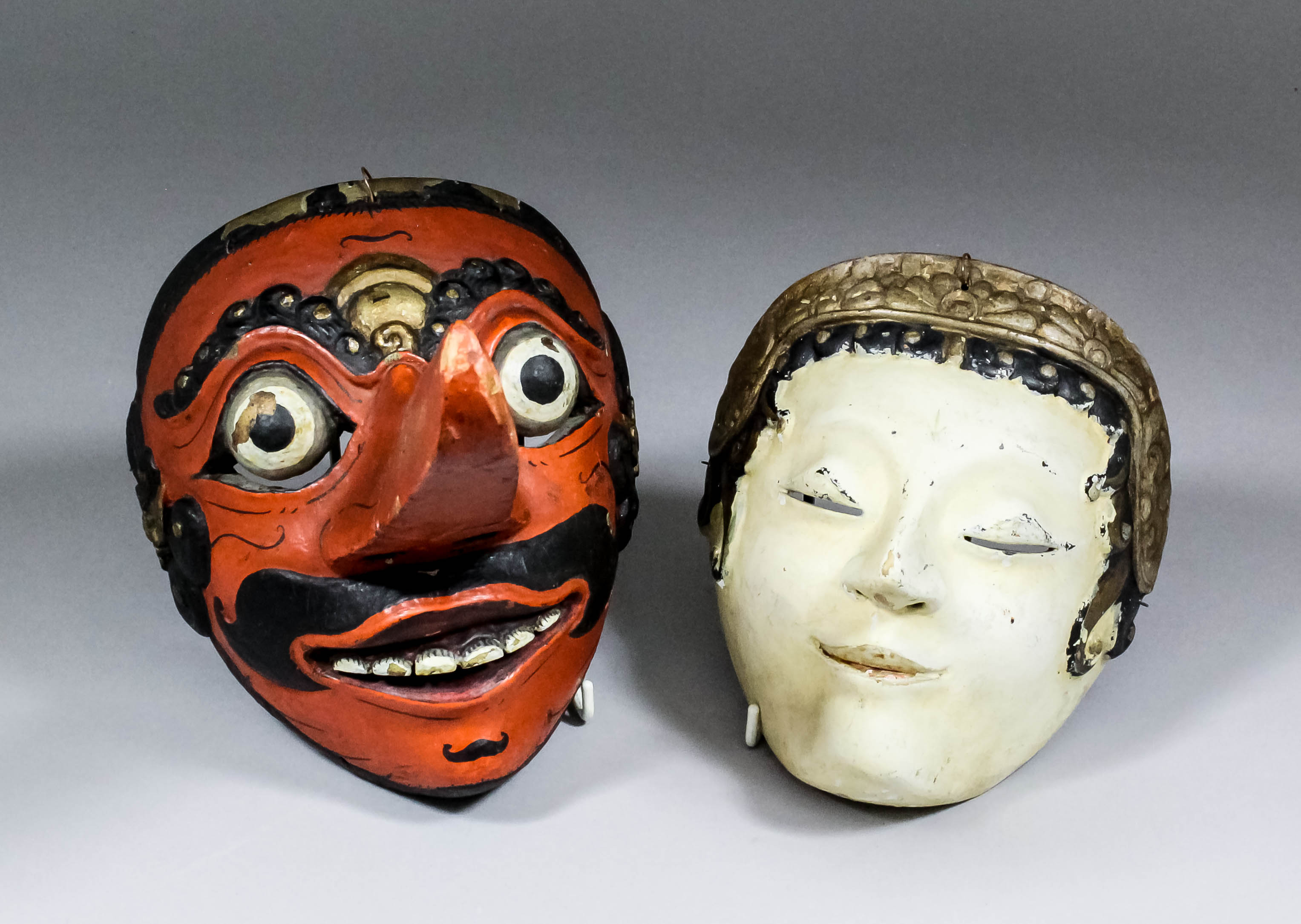 A late 19th century Javanese carved wood and painted mask to represent Klana Bapang ( the Giant