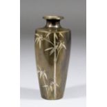 A Japanese bronze vase of slender baluster form inlaid in silver with a bamboo design, 4.75ins (