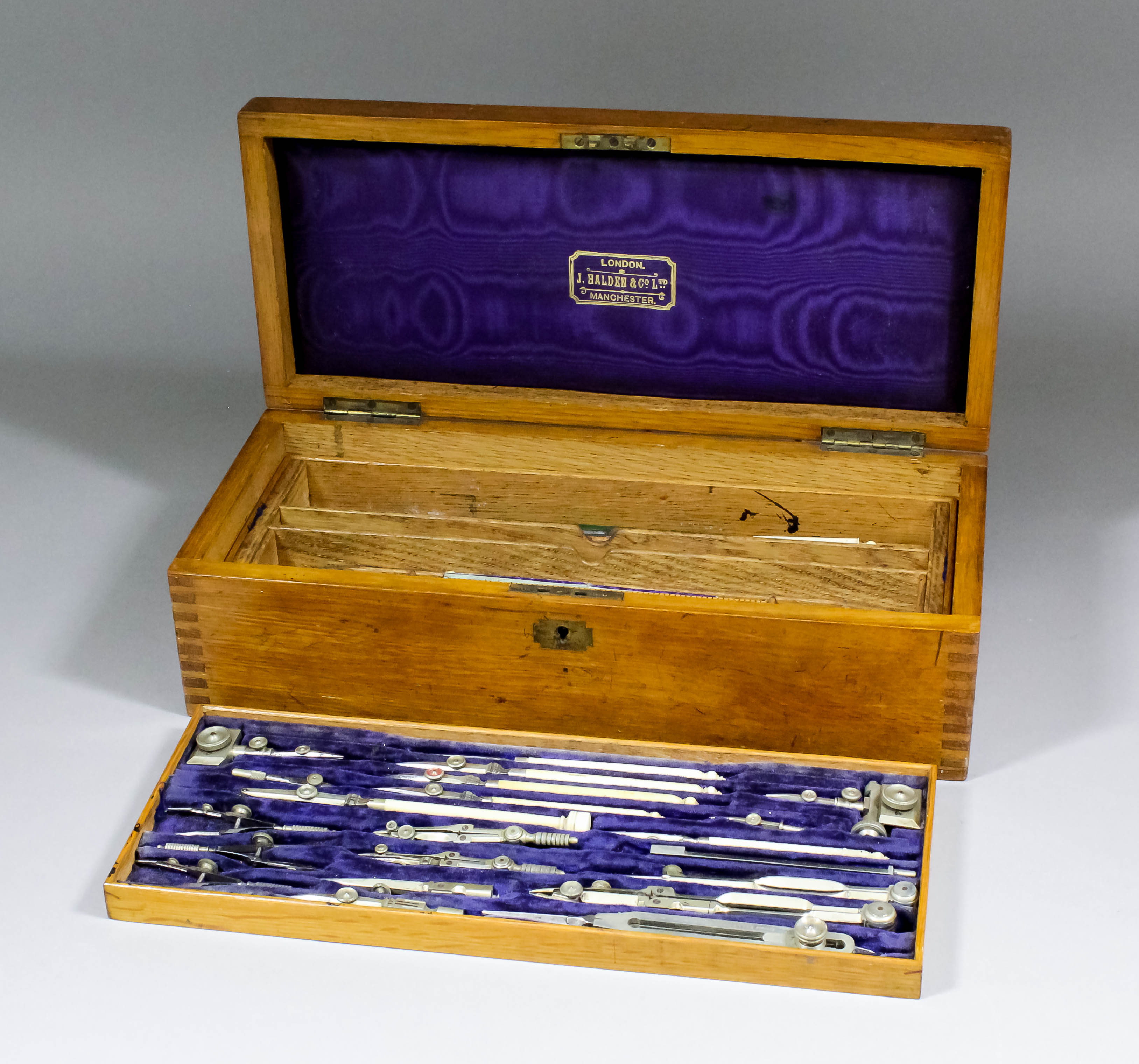 A set of late 19th/early 20th Century drawing instruments retailed J. Holden & Co Ltd, London and