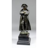 19th Century French School - Dark brown patinated bronze standing figure of Napoleon, 12.5ins