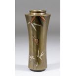 A Japanese bronze vase inlaid in silver, copper and shakudo with a snail and bamboo design, 6ins (