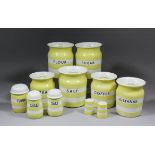 Six T.G. Green yellow "Cornish Ware" storage jars and covers, three 7ins high and three 6.25ins