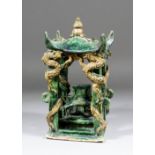 A small Chinese Sancai glazed pottery dragon shrine, modelled in the form of a pagoda with dragons