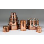 Five Victorian copper jelly moulds, the first of lobed buttressed form, the plain ring marked with