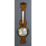 A 19th Century mahogany cased wheel barometer and thermometer by C.Farelli of Northampton, the
