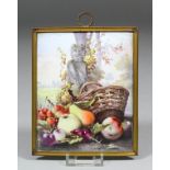 A 19th Century Continental enamel rectangular plaque enamelled with fruit and a basket before a