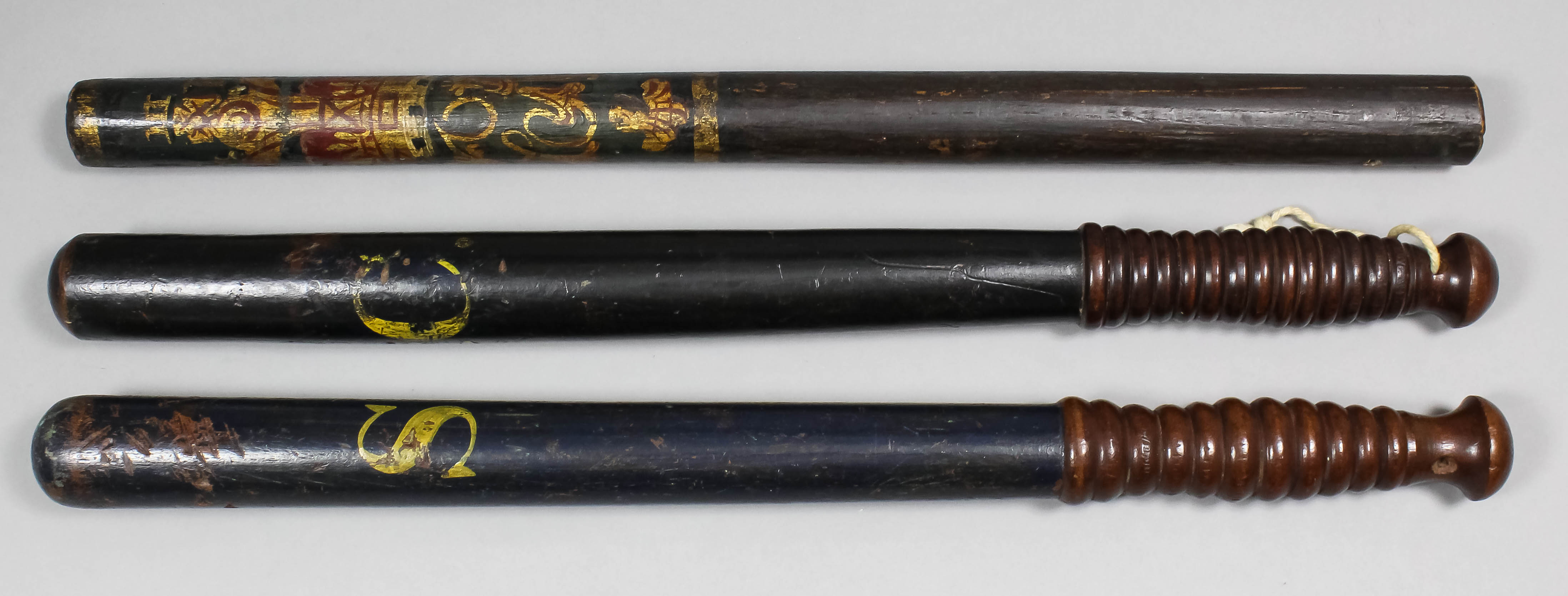 Two Victorian turned wood truncheons, both painted with the initials "S.C." (Special Constable),