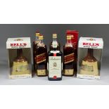 Eight bottles of blended Whisky, comprising - Johnnie Walker "Red Label" (five - mostly one