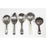 Two George III silver caddy spoons - with oval bowl engraved with leaf and floral ornament, by