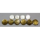 A set of six early 20th Century Japanese gilt metal and black enamel circular buttons, each