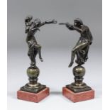 19th Century French School Pair of brown patinated bronze figures - One playing the pipes and the