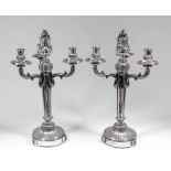 A pair of early 20th Century French plated three light candelabra by Bointaburet of Paris to match
