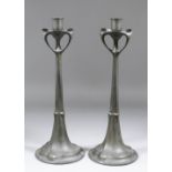 A pair of late 19th Century Kayserzinn pewter candlesticks designed by Hugo Leven, the plain