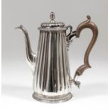 A George II silver coffee pot the domed cover with acorn finial and bead mounts, with fluted tapered