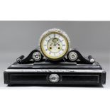 A 19th Century French black marble cased mantel clock by J. Marti & Cie, No. 1999, the 4.75ins