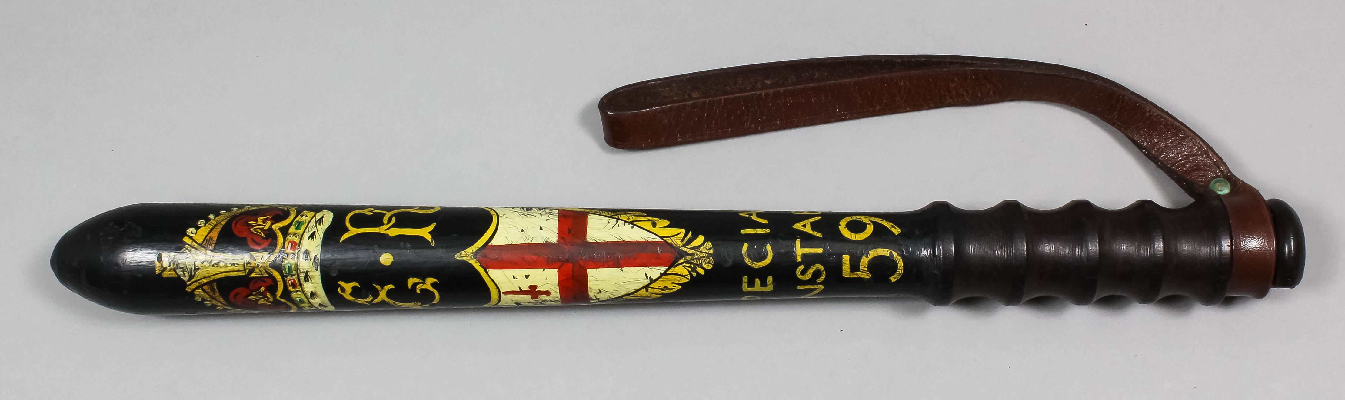 An Edward VII Special Constable's short weighted truncheon painted with "E.R" beneath a crown,