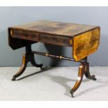 A George III mahogany sofa table, the figured veneered top to centre later inlaid with bold oval