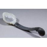 A Moghul two coloured jade anointing spoon with white jade shell pattern bowl and dark celadon