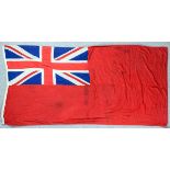 A Red Ensign, 52ins x 108ins (flown on the last voyage of the "Queen Mary", a coloured photograph of