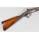 A 12 bore side by side hammer shotgun by W. Green of London, Serial No. 1147, the 30ins Damascus