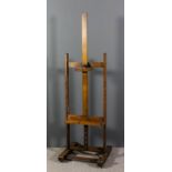 A 20th Century oak adjustable Studio easel by Reeves and Sons of London, 20ins wide x 58ins high,