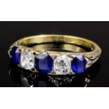 A late Victorian 15ct gold sapphire and diamond five stone ring, the three sapphires each