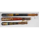 A Victorian turned wood truncheon painted with a crown over the royal cipher, 8.25ins, the butt
