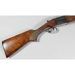 A 12 bore over and under box lock shotgun by Baikal, Serial No. 8842969, 26.75ins blued steel