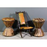 A pair of modern circular drum pattern stools of waisted form, the whole upholstered in tan hide,