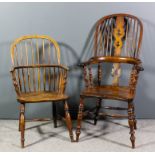 A 19th Century alder and elm seated "Yorkshire" Windsor armchair, the high two tier stick back