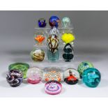 A collection of glass paperweights, including - Caithness "Moonflower", 2.75ins high, Selkirk "