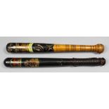 A Victorian turned wood truncheon painted with a crown over the royal cipher above "S.C." and "
