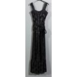 A 1960s Mary Quant black lace and floral figured crepe maxi dress, the sleeveless bodice with