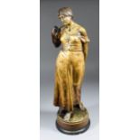 A late 19th/early 20th Century Goldschieder gilt bronzed terracotta figure of a standing young woman