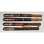 A Victorian turned wood truncheon painted with a crown over a royal cipher above gilt and red