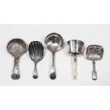 A George IV silver caddy spoon, the shell pattern bowl embossed with flowers and basket weave, and