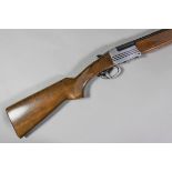 A 28 bore over and under box lock shotgun by Investarm, Serial No. 424671, the 28ins blued steel